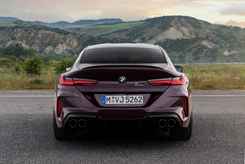 Illustration for article titled Look how purple this 600 HP BMW M8 Gran Coupe is